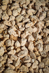 Medium gravel of warm tones background