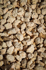 Medium gravel of warm tones background