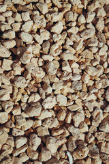 Medium gravel of warm tones background