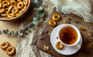 Russian traditional sweets dry bakery bagels and white cup of tea