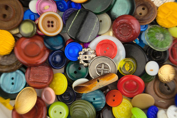 beautiful abstract sewing background of buttons