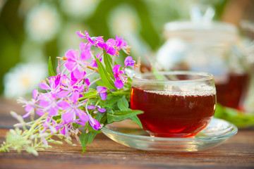 delicious green tea in beautiful glass bowl on table