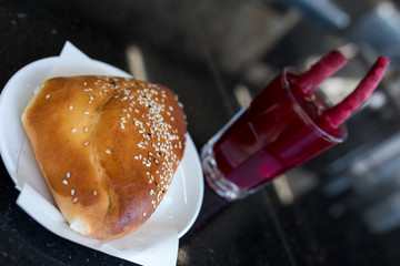 Traditional turkish drink turnip juice (Salgam) and turkish bagel