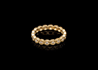 Yellow Luxury Gold Rings on Black Background