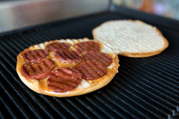 Toast sandwich breakfast with cheese and sausages