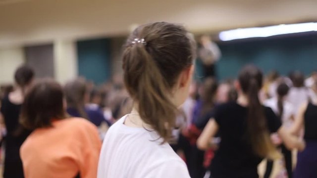 Open dance lesson. The girl is dancing.