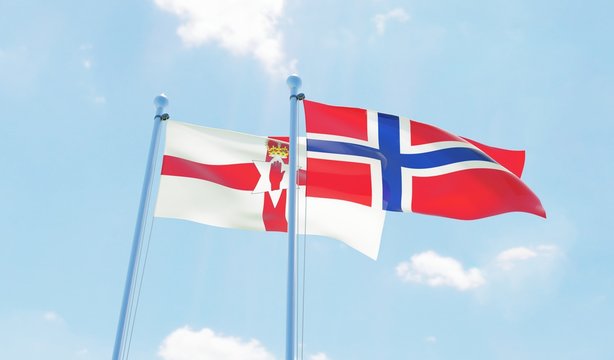 Norway and Northern Ireland, two flags waving against blue sky. 3d image