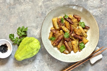 chayote with beef and sesame in asian style. The dish is popular in Asia, especially in Vietnam. recipe with chayote. copy space. place for text. top view