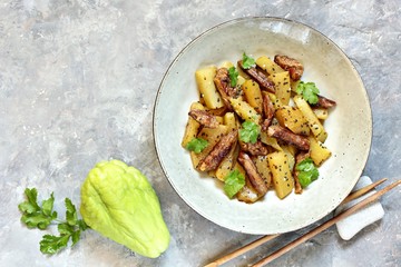 chayote with beef and sesame in asian style. The dish is popular in Asia, especially in Vietnam. recipe with chayote. copy space. place for text. top view