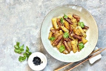 chayote with beef and sesame in asian style. The dish is popular in Asia, especially in Vietnam. recipe with chayote. copy space. place for text. top view