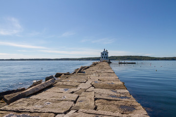 A cute little lighthouse on a perfect summer day