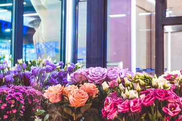 Fototapeta premium Various bouquets in flower shop by March 8. Gift. Fresh aroma. Botany. Beauty. Background.