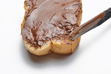 Bread with chocolate nougat cream. Breakfast