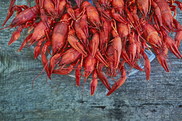 Crawfish cooked and served on wooden background