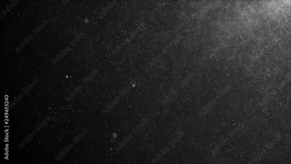 Poster natural organic dust particles floating on a black background. glittering sparkling particles random