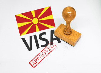 North Macedonia Visa Approved with Rubber Stamp and flag