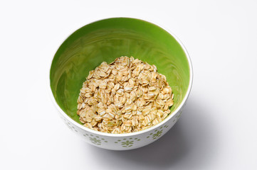 Healthy breakfast. Grain in  gree bowl isolated on white background