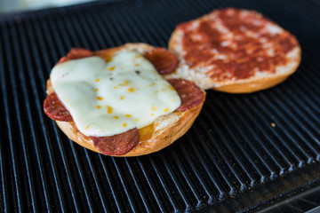 Toast sandwich breakfast with cheese and sausages