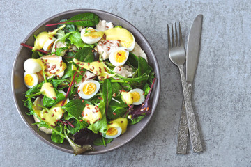 Healthy colorful salad bowl. Salad with chicken breast, quail eggs and flaxseeds. Concept of healthy or dietary food. Superfoods Eco food. Fitness food. Keto diet recipe.
