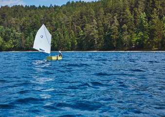 Sailing training yachting sport kids in lake