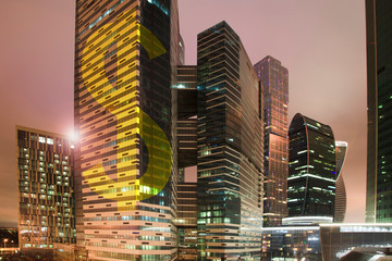 Obraz premium Fnancial concept, Gold Dollar sign on a skyscraper building.