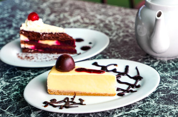 Cake on a white plate, a snapshot of real life.