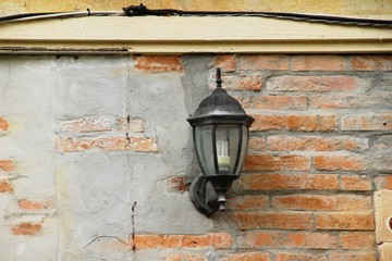Lamp beside the brick wall vintage style