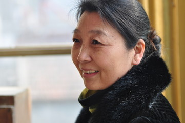 A middle-aged Asian woman