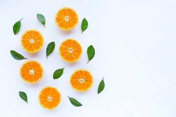 High vitamin C, Orange fruits with leaves on white background.