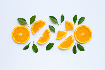 High vitamin C. Fresh orange citrus fruit with leaves isolated on white.