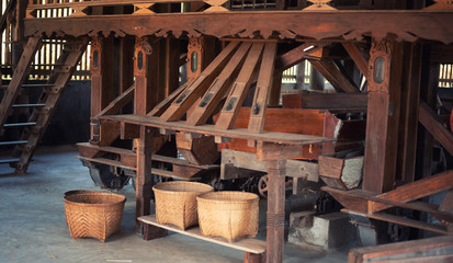 old wooden rice milling machine. .The ancient rice mill is also available in Thailand