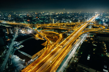 Fototapeta na wymiar The amazing nightview of highway in Osaka, expressway enter the city, night light picture on top view