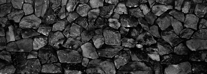 Natural fire ashes with dark grey black coals texture. It is a flammable black hard rock.  Space for text. 