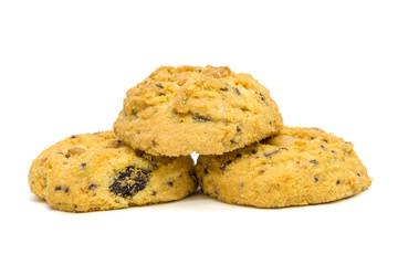 butter cookies with cashew nuts forming pyramid at eye level. isolated on white background
