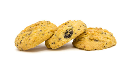 butter cookies with cashew nuts at eye level. isolated on white background