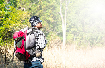 Young Rookie Traveler with backpack mountaineering Travel Lifestyle.