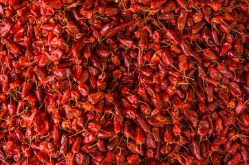 dried red peppers for sale in outdoor market