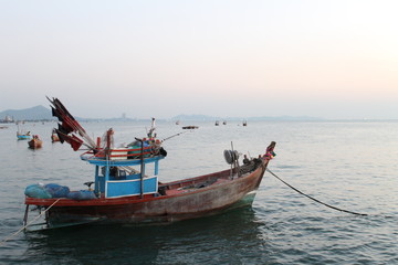 Obraz premium old fishing boat in the sea