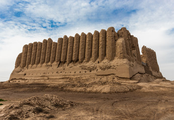 Major Kyz-Kala, a fortress with corrugated, as if pleated, walls, located in ancient Merv which was one of the major cities standing on a silkway route. Once was the capital of Turkmen-Seljuk Empire. - obrazy, fototapety, plakaty