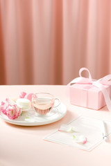 Gift with flowers and a cup of tea -  Anniversary day