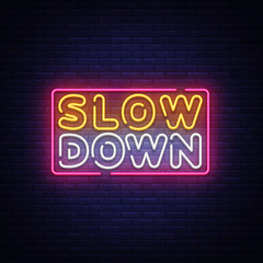 Slow Down neon sign vector. Slow Down Design template neon text, light banner, neon signboard, nightly bright advertising, light inscription. Vector illustration - obrazy, fototapety, plakaty