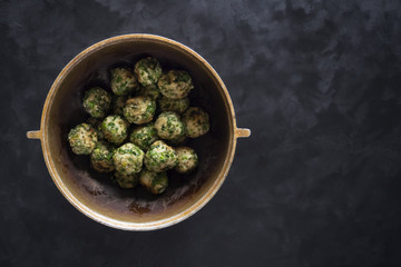 Handmade meatballs in the old cauldron. Top view.