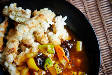 Sweet sour sauce with fried rice cake
