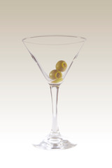 Empty glass with olives