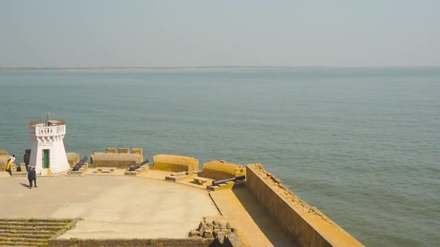 The old lighthouse on the famous tourist spot of fort diu in gujarat, overlooking the arabian sea
