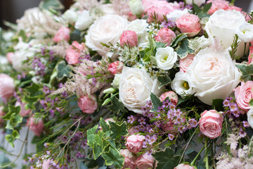 Beautiful flowers on the table.The restaurant is decorated with flowers on the wedding day. Close up.