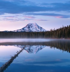 Volcano Mount Adams at Sunrise with Lake Reflection Washington State Great Northwest United States. Beautiful morning sky. Amazing landscape holiday concept 