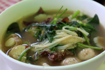 Authentic traditional Thai food: A clear soup with noodles, pork and tofu.