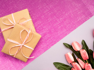 Purple tulip and gift box on Purple background