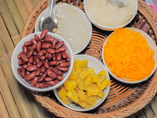 close up five king of Thai dessert, red beans,  sweet patato, Sweet Golden Egg Threads (Foi Thong), Sticky Rice, Luk Jak © Yuttana Joe